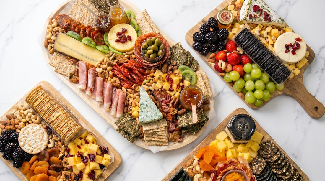 Charcuterie board selection from The Smokehouse Collective Singapore — meat and cheese platters, cold cuts, artisanal cheeses, seasonal fruits, and crackers arranged on wooden boards for islandwide delivery 