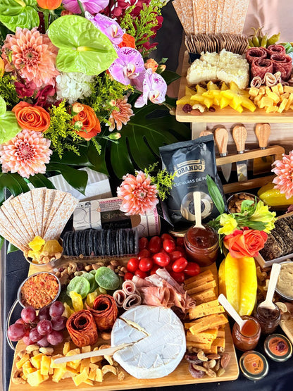 Signature grazing table spread with charcuterie, cheese, fruits and florals — The Smokehouse Collective Singapore