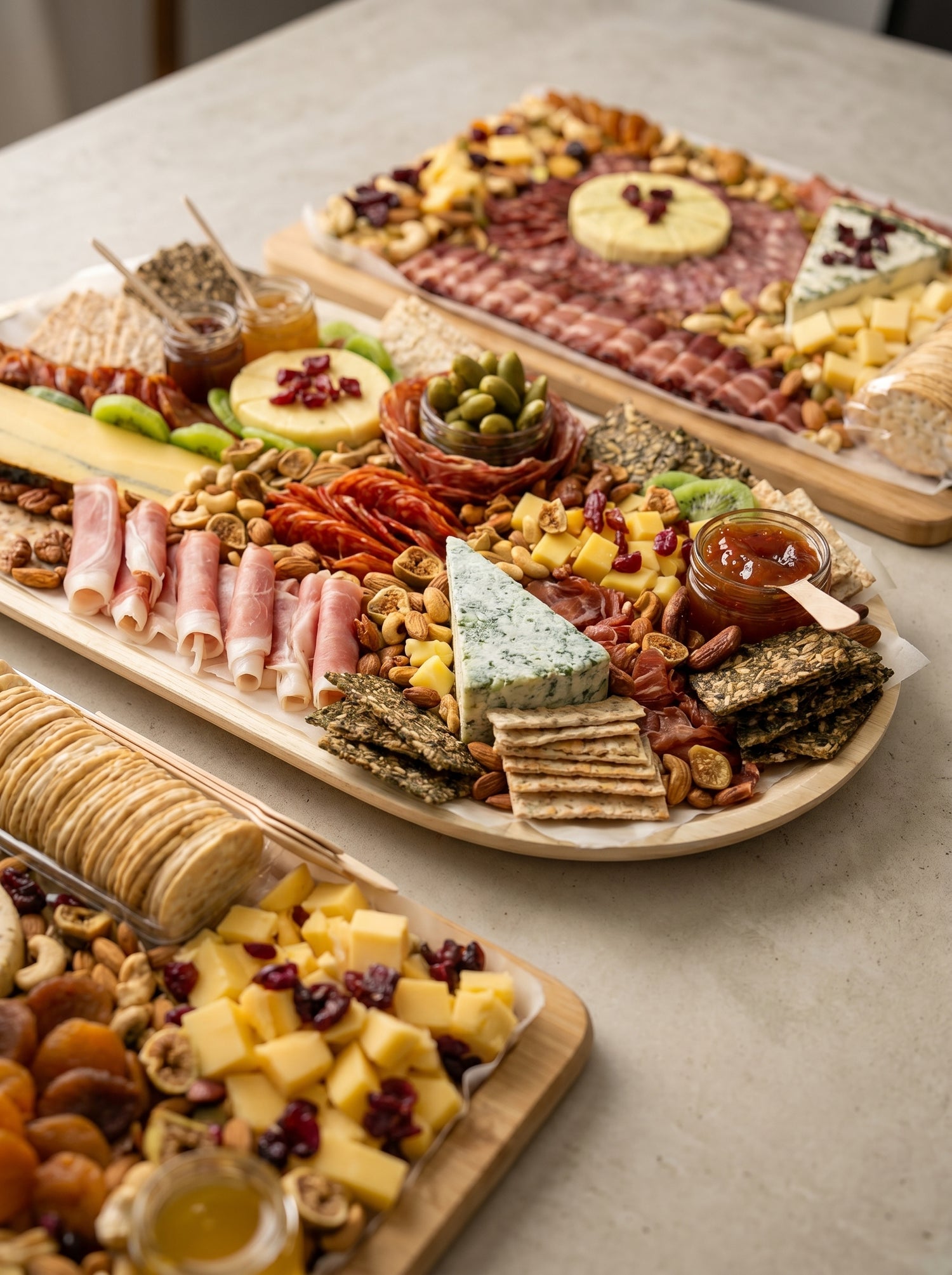 Charcuterie board and cheese platter spread with cold cuts, crackers, and condiments — Singapore sharing platters by The Smokehouse Collective